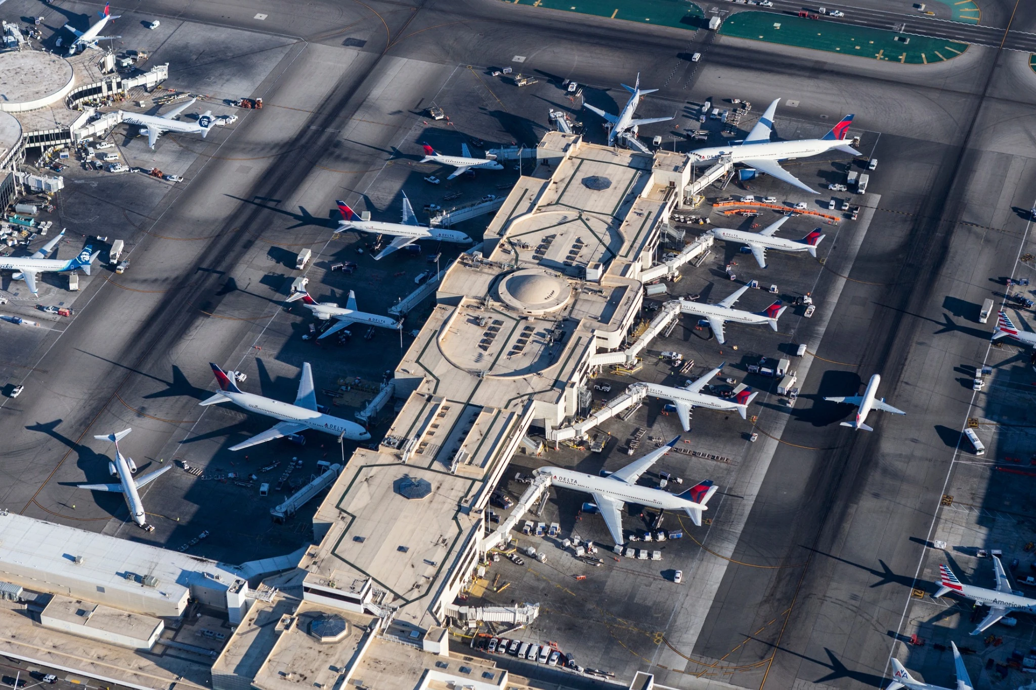 Aircraft at terminal gates, seen from above